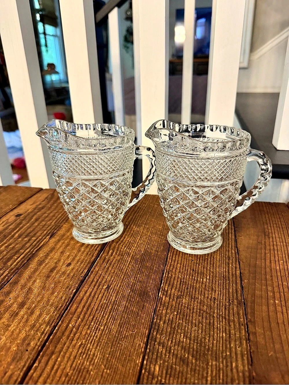 Pair of matching vintage Anchor Hocking Wexford small clear glass pitchers
